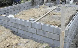 Professionals building a foundation with blocks in Allentown, PA