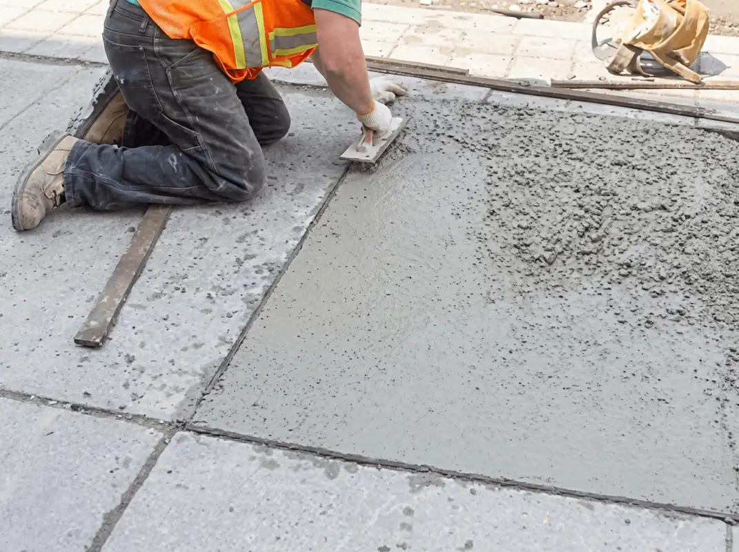 Professional repairing a concrete floor in Allentown, PA
